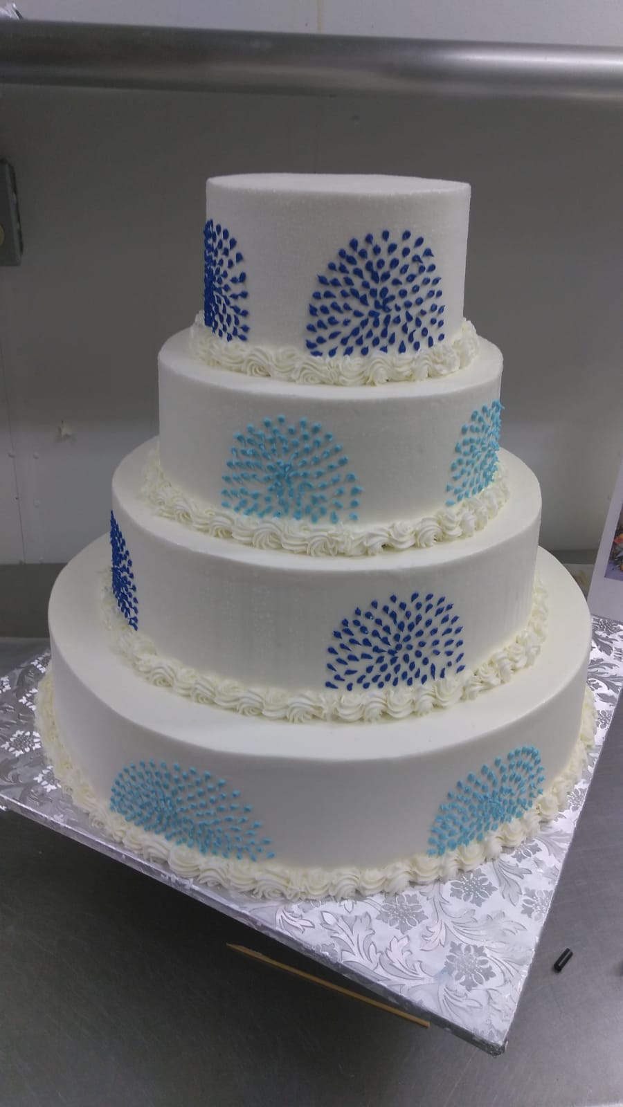 Blue dot tiered cake